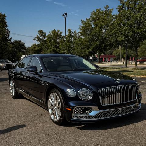 Dark Bentley sedan with a mirror finish